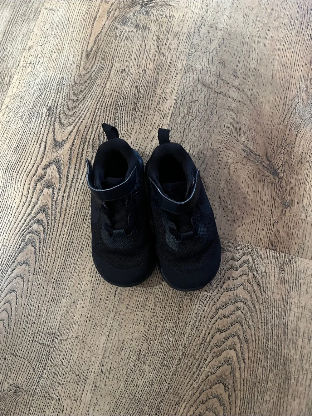 Black Nike kids shoes